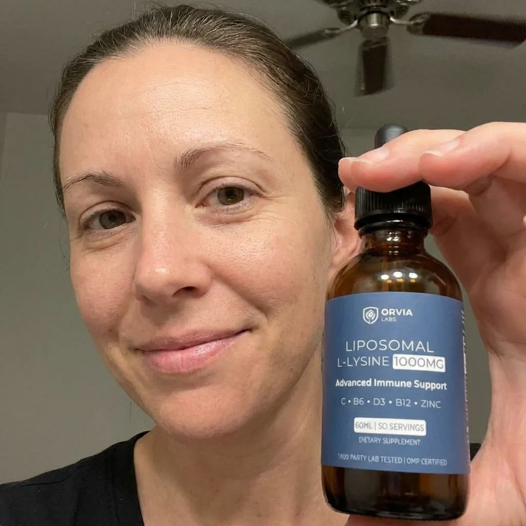 Jessica M. holding Orvia Labs bottle